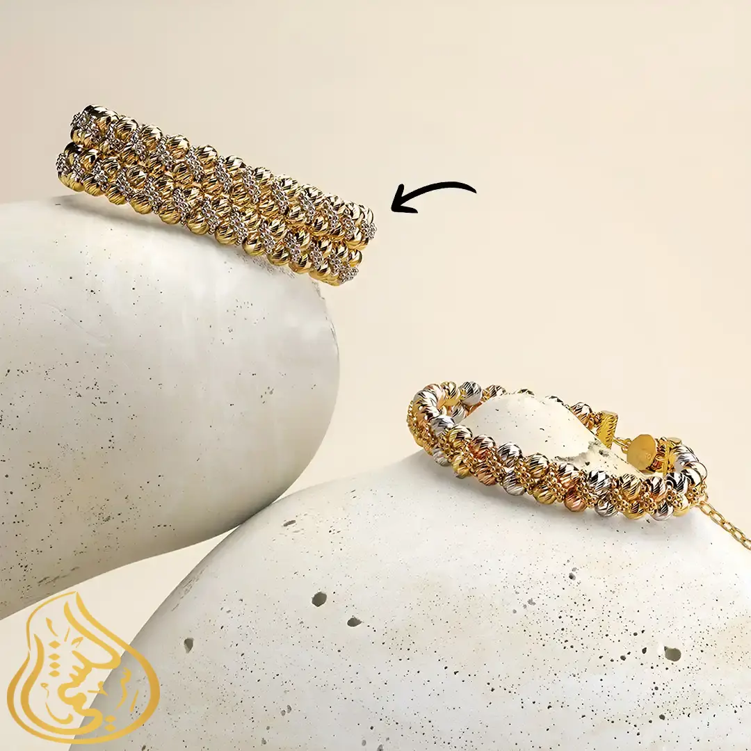 أسوار ذهبي عريض بتصميم عصري وكرات أنيقة